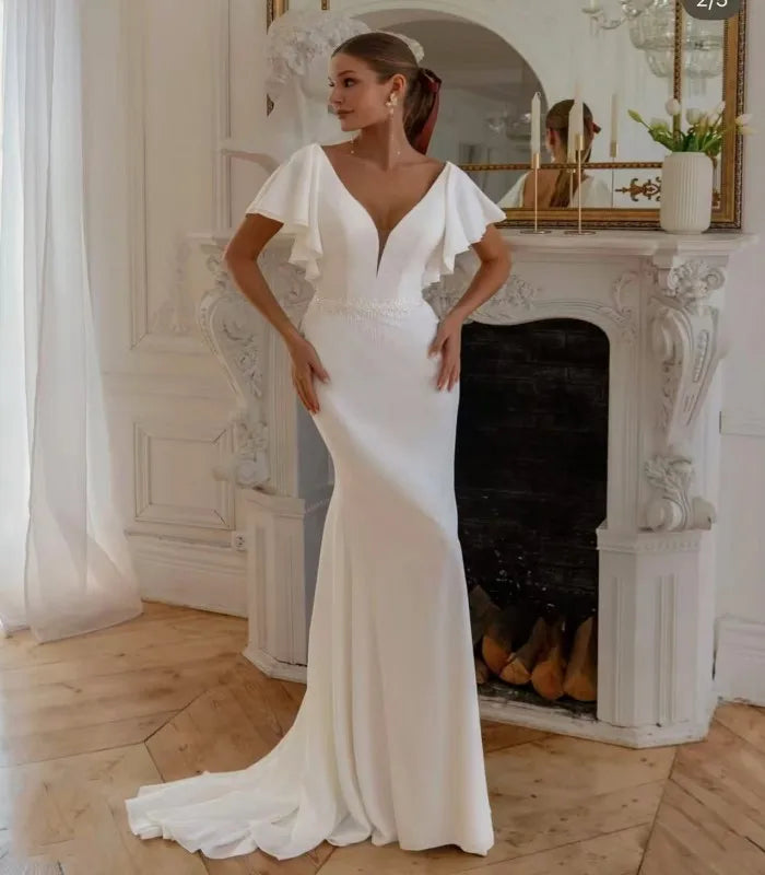Elegant Chiffon Mermaid Wedding Dress 2026 Sexy Deep V Open Back Ruffled Sleeve Modern Women Bridal Dresses